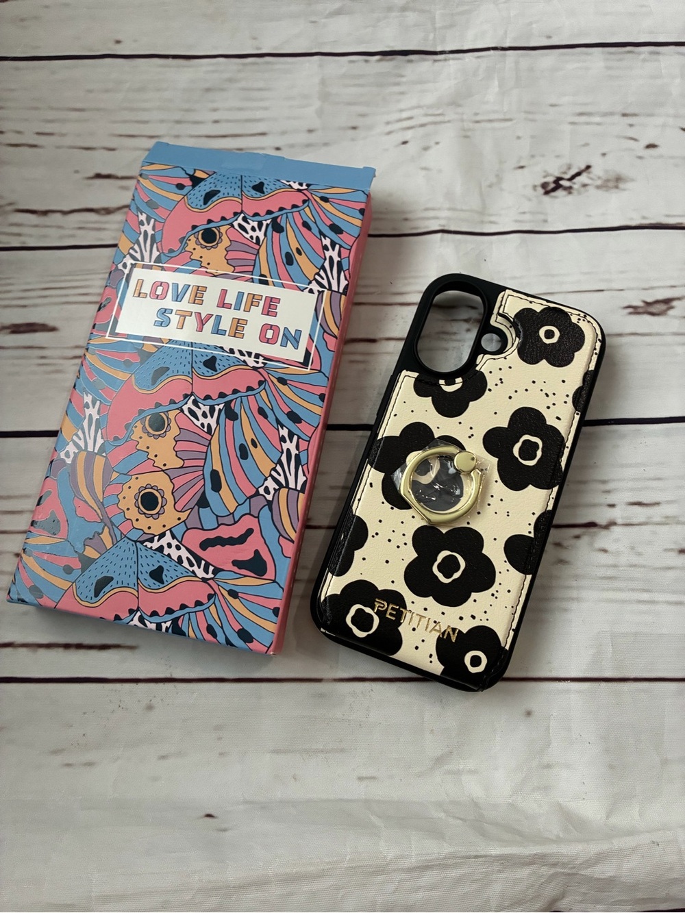New in box Petitian floral cream and black iPhone 17 case